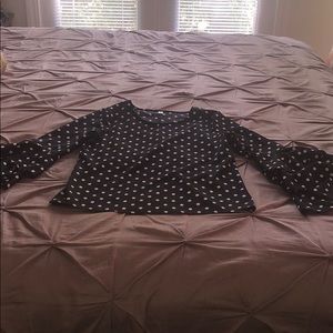 Polka dot blouse with bell- ruffled sleeves